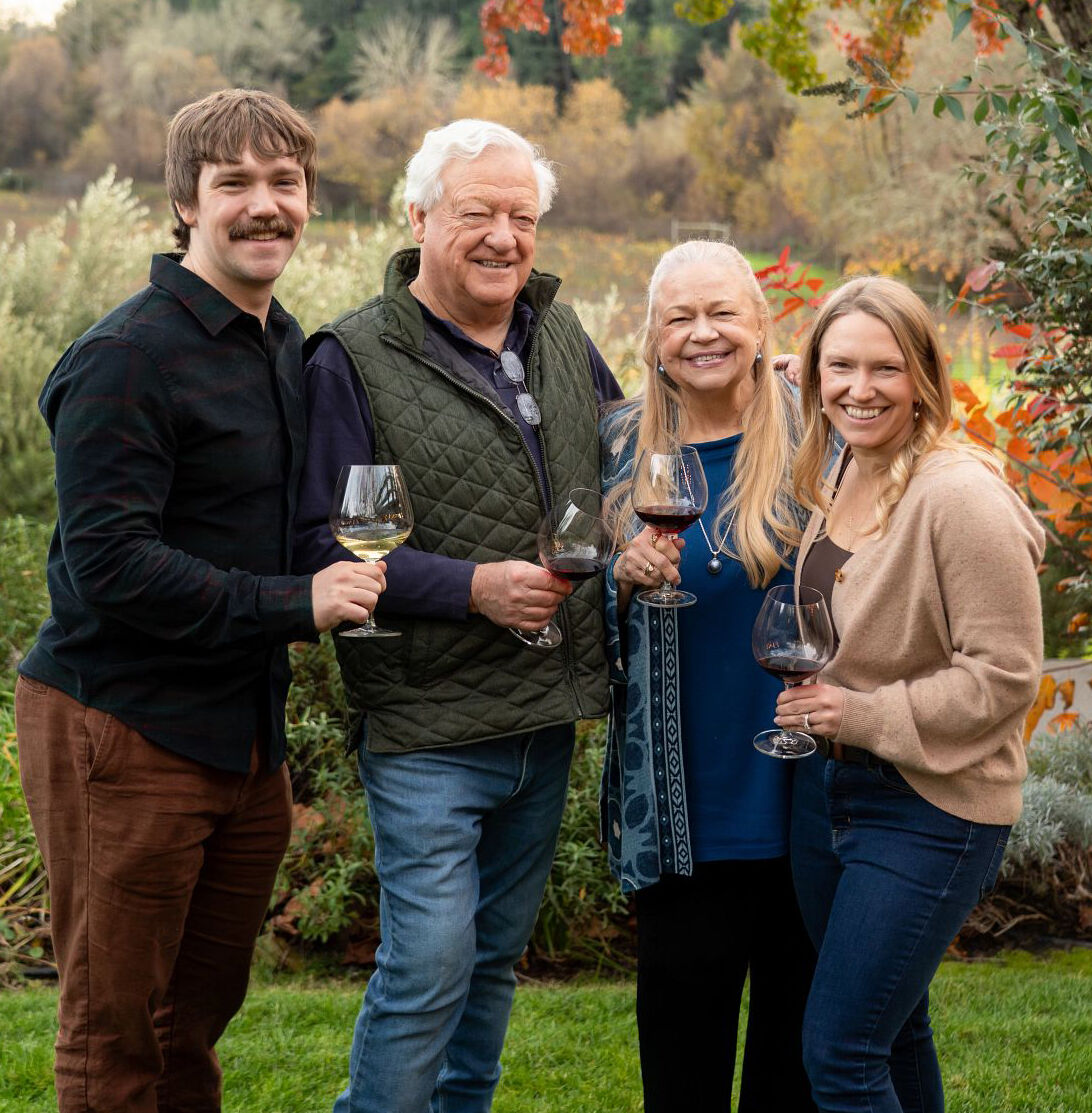 The Hartford family toasting with a glass of Hartford Chardonnay