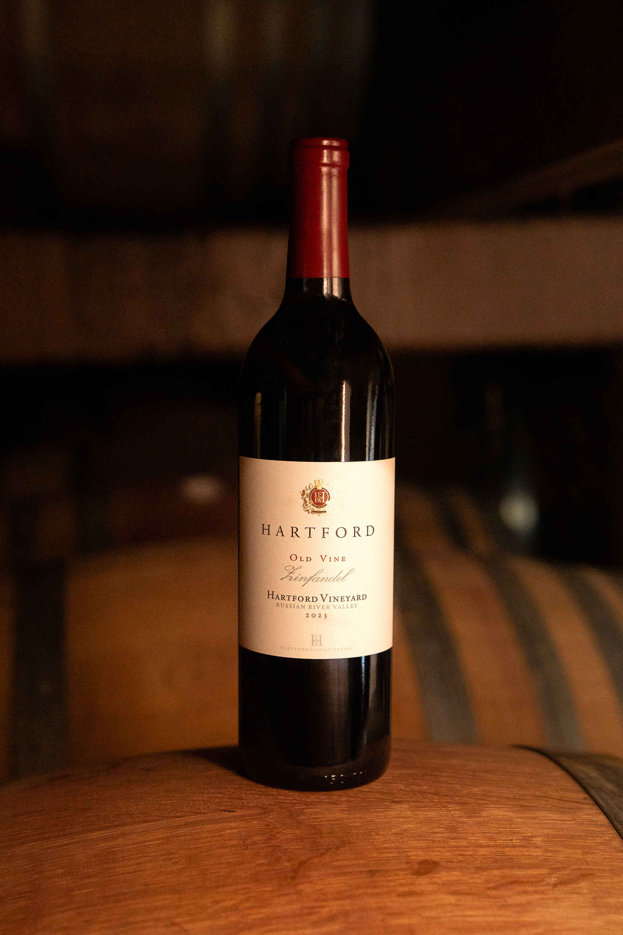 A bottle of Hartford Vineyard Zinfandel in the barrel room.